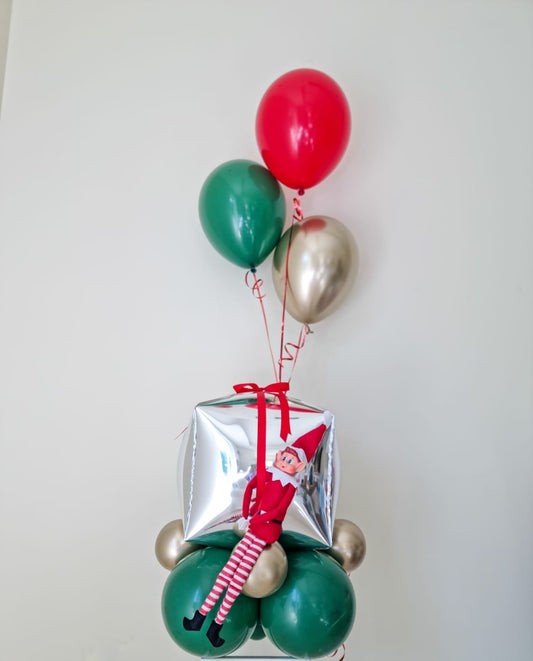Naughty elf balloon arrangement